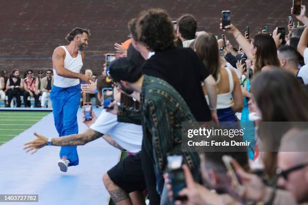 Fashion designer Marcelo Burlon acknowledges the applause of the audience at the Marcelo Burlon County Of Milan fashion show during the Milan Fashion...