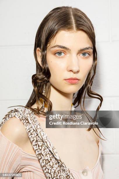 Model poses in the backstage at the Federico Cina fashion show during the Milan Fashion Week S/S 2023 on June 18, 2022 in Milan, Italy.