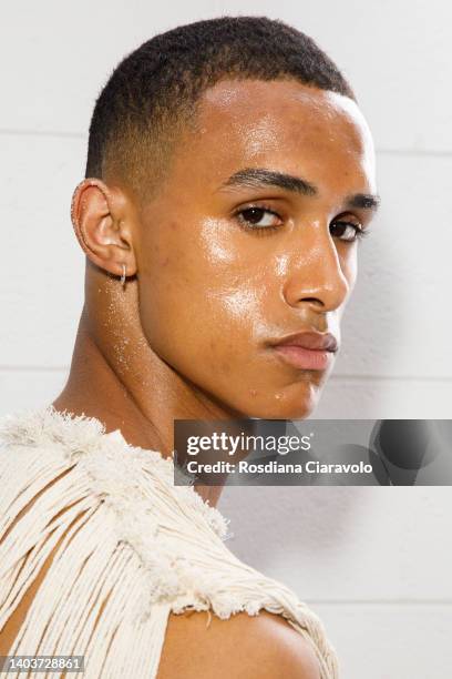 Model poses in the backstage at the Federico Cina fashion show during the Milan Fashion Week S/S 2023 on June 18, 2022 in Milan, Italy.