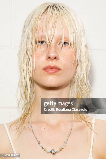 Model poses in the backstage at the Federico Cina fashion show during the Milan Fashion Week S/S 2023 on June 18, 2022 in Milan, Italy.