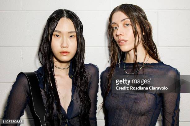 Models pose in the backstage at the Federico Cina fashion show during the Milan Fashion Week S/S 2023 on June 18, 2022 in Milan, Italy.