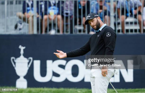 Jon Rahm of Spain reacts on the 16th green during the third round of the 122nd U.S. Open Championship at The Country Club on June 18, 2022 in...