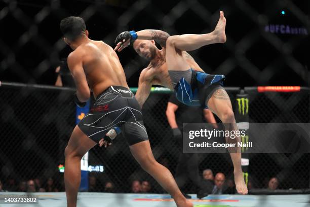 Adrian Yanez kicks Tony Kelley in a bantamweight fight during the UFC Fight Night event at Moody Center on June 18, 2022 in Austin, Texas.