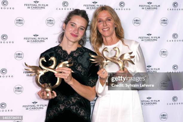 Awarded "Women revelation" Rebecca Marder and awarded "Best first romantic film" Sandrine Kiberlain pose during the closing ceremony at the 36th...