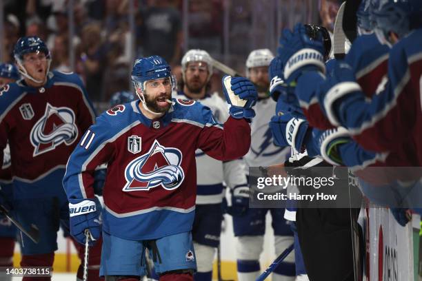 Andrew Cogliano of the Colorado Avalanche celebrates with teammates after a goal in the first period in Game Two of the 2022 NHL Stanley Cup Final...