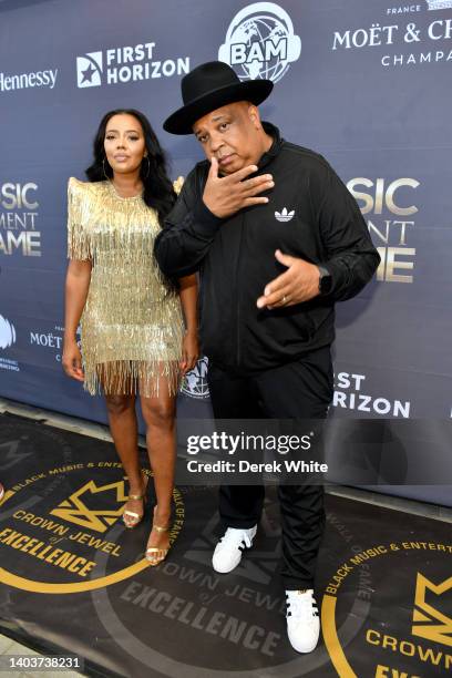 Angela Simmons and Rev Run attend the 2022 Black Music & Entertainment Walk Of Fame Induction Ceremony & Juneteenth Celebration at The Home Depot...