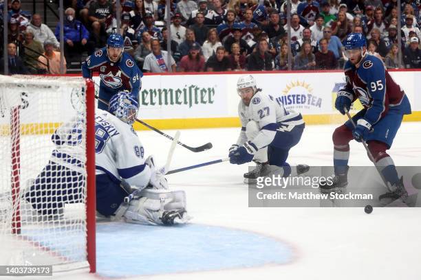 Andre Burakovsky of the Colorado Avalanche scores a goal on Andrei Vasilevskiy of the Tampa Bay Lightning during the first period in Game Two of the...