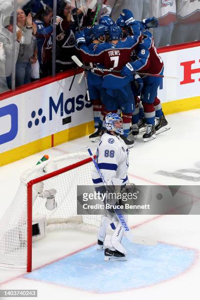 Andre Burakovsky of the Colorado Avalanche celebrates with teammates after scoring a goal during the first period in Game Two of the 2022 NHL Stanley...
