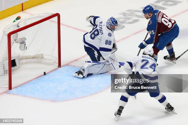 Andre Burakovsky of the Colorado Avalanche scores a goal on Andrei Vasilevskiy of the Tampa Bay Lightning during the first period in Game Two of the...