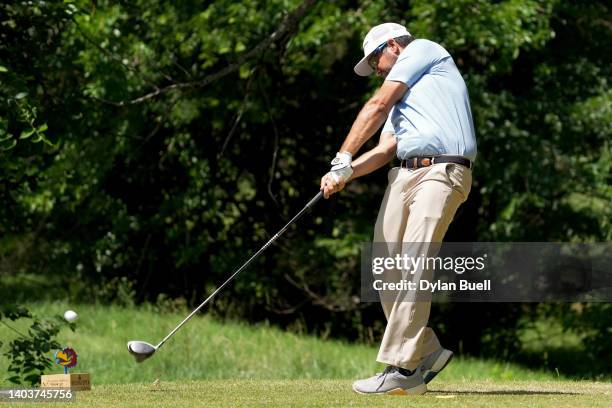 Erik Compton of the United States plays his shot from the third tee during the third round of the Wichita Open Benefitting KU Wichita Pediatrics at...