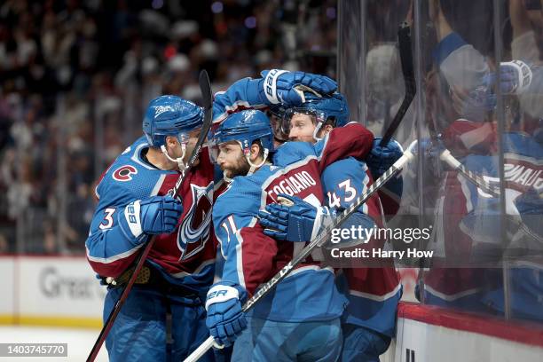 Darren Helm of the Colorado Avalanche celebrates with teammates after scoring a goal during the second period in Game Two of the 2022 NHL Stanley Cup...