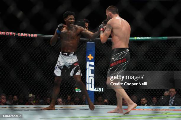 Kevin Holland reacts while facing Tim Means in a welterweight fight during the UFC Fight Night event at Moody Center on June 18, 2022 in Austin,...