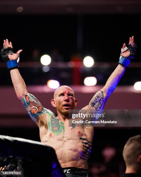 Josh Emmett celebrates defeating Calvin Kattar in their featherweight fight at the UFC Fight Night event at Moody Center on June 18, 2022 in Austin,...