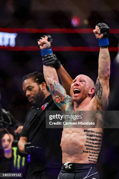 Josh Emmett celebrates defeating Calvin Kattar in their featherweight fight at the UFC Fight Night event at Moody Center on June 18, 2022 in Austin,...