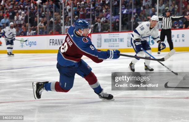 Cale Makar of the Colorado Avalanche follows through on his shot for a shorthanded goal against the Tampa Bay Lightning in the third period of Game...