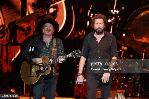 Kix Brooks and Ronnie Dunn of Brooks & Dunn perform during the Reboot 2022 Tour at Bridgestone Arena on June 18, 2022 in Nashville, Tennessee.