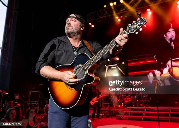 Lee Brice performs at Michigan Lottery Amphitheatre on June 18, 2022 in Sterling Heights, Michigan.