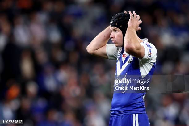 Matt Burton of the Bulldogs looks on during the round 15 NRL match between the Canterbury Bulldogs and the Wests Tigers at CommBank Stadium, on June...