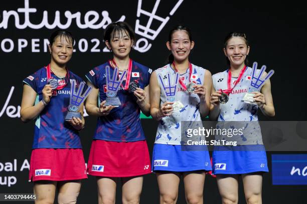 Yuki Fukushima, Sayaka Hirota, Nami Matsuyama and Chiharu Shida of Japan pose with their medals after the Women's Doubles Final match on day six of...