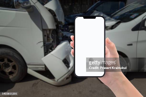 woman hand hotographs her car with damage for smartphone accident insurance - cockpit voice recorder stockfoto's en -beelden