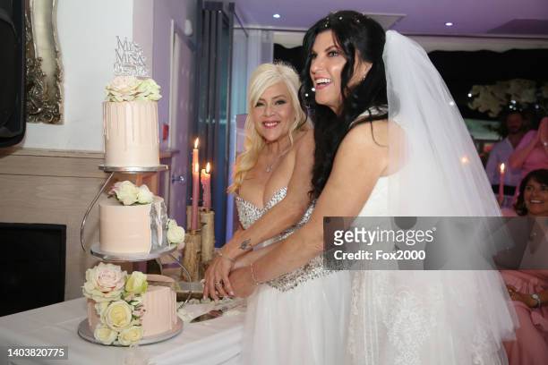 Samantha Fox and Linda Birgitte Olsen marry at King's Oak Hotel, Loughton, on June 18, 2022 in London, England. Diamond wedding rings by Rankins,...