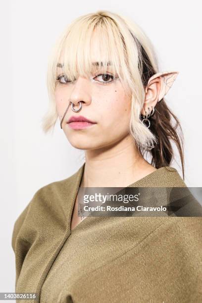 Model poses in the backstage at the Simon Cracker fashion show during the Milan Fashion Week S/S 2023 on June 19, 2022 in Milan, Italy.