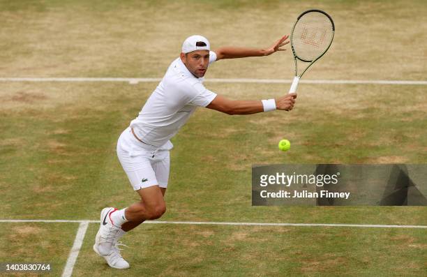 Filip Krajinovic of Serbia plays a backhand against Matteo Berrettini of Italy during the Men's Singles Final match on day seven of the cinch...