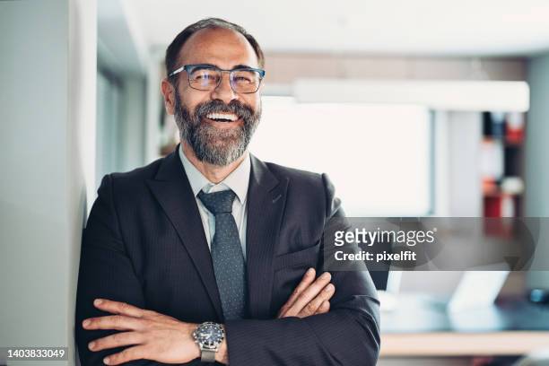 successful mature businessman - mens wrist watch stockfoto's en -beelden