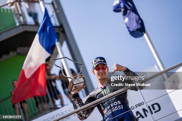 Fabio Quartararo of France and Monster Energy Yamaha MotoGP with his trophy under the french flag on the podium after the race of the MotoGP Liqui...
