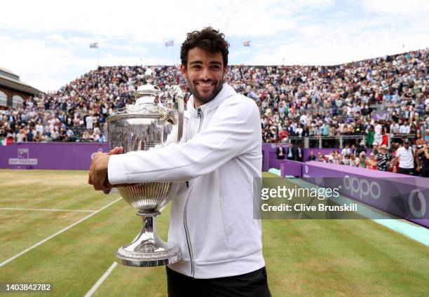 Matteo Berrettini of Italy celebrates with the trophy after winning against Filip Krajinovic of Serbia during the Men's Singles Final match on day...