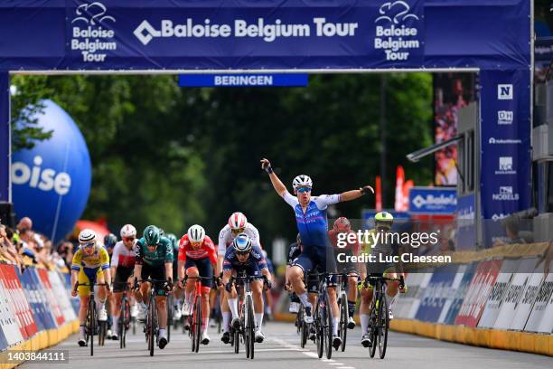 Fabio Jakobsen of Netherlands and Team Quick-Step - Alpha Vinyl celebrates winning ahead of Jasper Philipsen of Belgium and Team Alpecin-Fenix and...