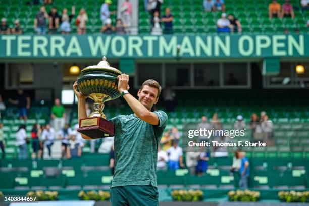 Hubert Hurkacz of Poland celebrates winning the final match against Daniil Medvedev of Russia during day nine of the 29th Terra Wortmann Open at...