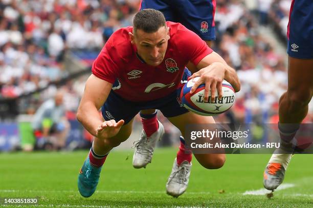 Jonny May of England crosses for the second try during the International match between England and Barbarians at Twickenham Stadium on June 19, 2022...