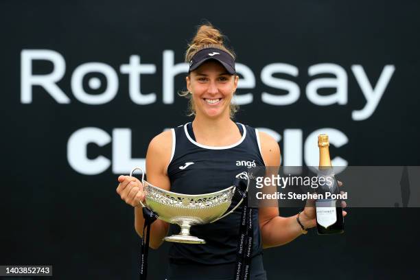 Beatriz Haddad Maia of Brazil celebrates with the Maud Watson Trophy after winning against Shuai Zhang of China in the Singles Final match on Day...