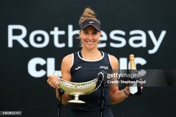 Beatriz Haddad Maia of Brazil celebrates with the Maud Watson Trophy after winning against Shuai Zhang of China in the Singles Final match on Day...