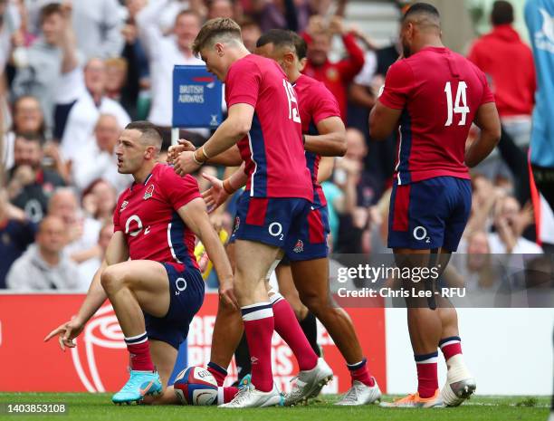 Jonny May of England celebrates scoring their sides second try during the International match between England and Barbarians at Twickenham Stadium on...