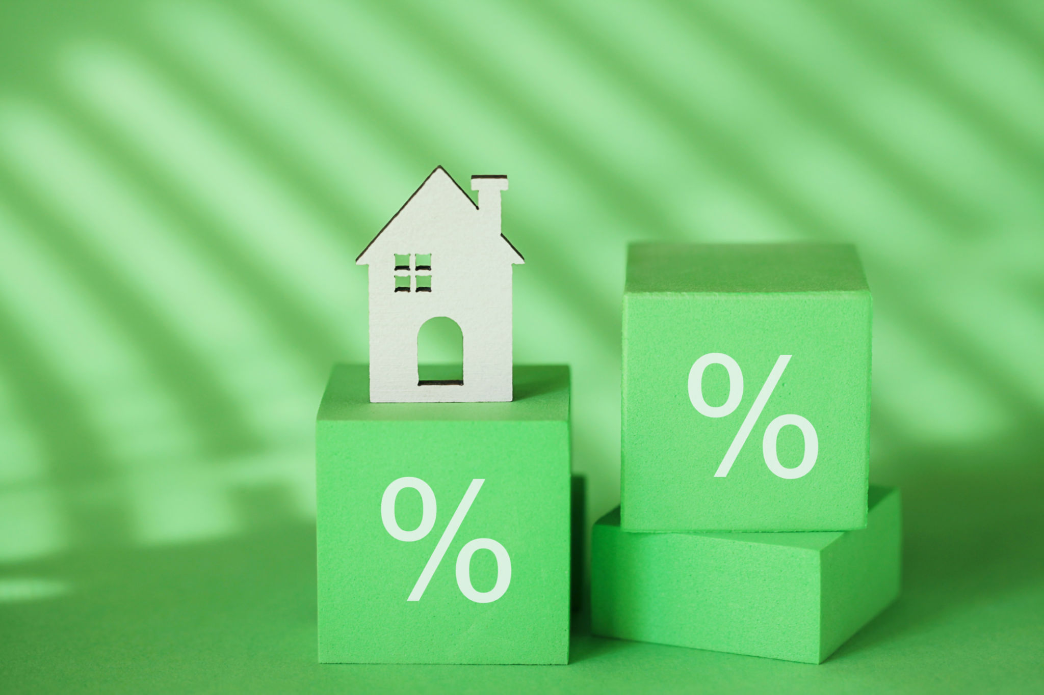 Percent symbol, Green House on Green background. ESG. Eco House Percent symbol, Green House on Green background. ESG. Eco House