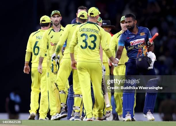 Chamika Karunaratne of Sri Lanka is congratulated by Marnus Labuschagne after Sri Lanka wins the match, lead 2-1, during the 3rd match in the ODI...