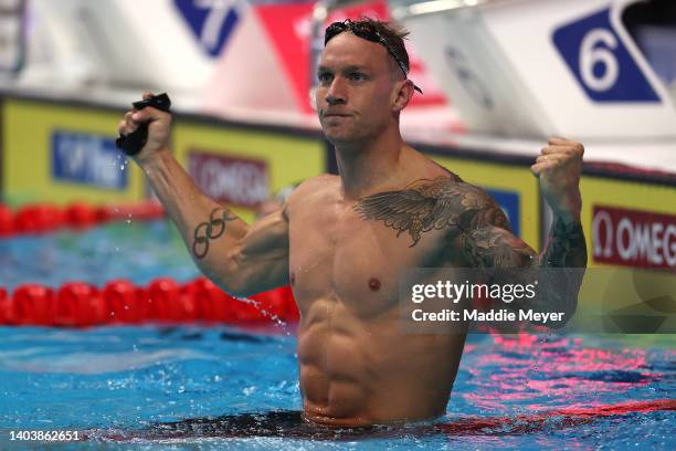 Caeleb Dressel of Team United States celebrates after winning Gold in the Men's 50m Butterfly Final on day two of the Budapest 2022 FINA World...