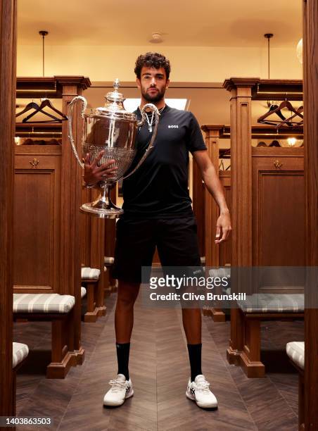 Matteo Berrettini of Italy poses with the trophy in the locker room after winning against Filip Krajinovic of Serbia during the Men's Singles Final...