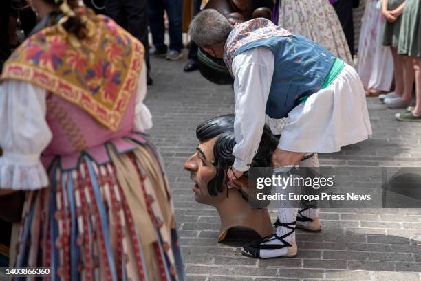 Man prepares for the parade of big-heads during the celebration of Corpus Christi in the center of Valencia, on 19 June, 2022 in Valencia, Valencian...