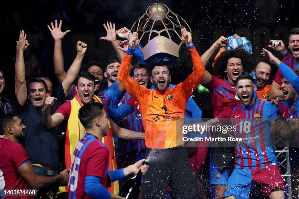 Team Captain Morena Perez de Vargas of Barca lifts the champions league trophy after beating Lomza Vive Kielce after extra time and penalty shoot out...