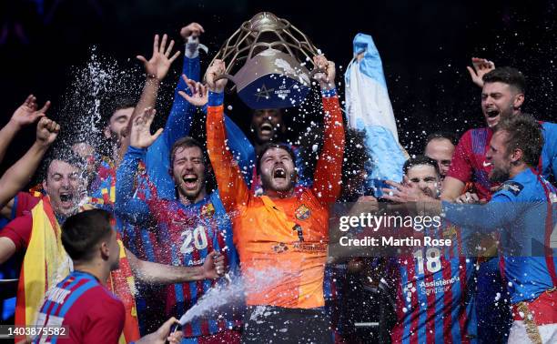 Team Captain Morena Perez de Vargas of Barca lifts the champions league trophy after beating Lomza Vive Kielce after extra time and penalty shoot out...