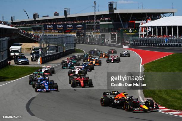 Max Verstappen of the Netherlands driving the Oracle Red Bull Racing RB18 leads the field at the start during the F1 Grand Prix of Canada at Circuit...