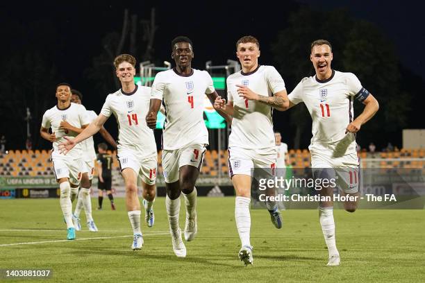 Alfie Devine of England celebrates with teammates after scoring their team's second goal during the UEFA European Under-19 Championship 2022 Group B...