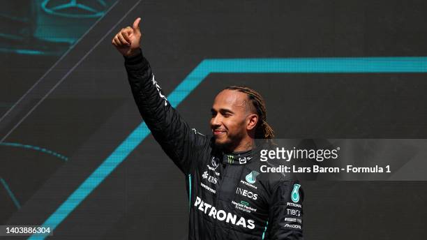 Third placed Lewis Hamilton of Great Britain and Mercedes celebrates on the podium during the F1 Grand Prix of Canada at Circuit Gilles Villeneuve on...