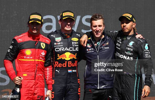 Race winner Max Verstappen of the Netherlands and Oracle Red Bull Racing , Second placed Carlos Sainz of Spain and Ferrari , Third placed Lewis...