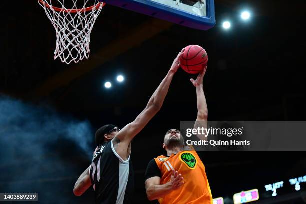 Dusan Bulut of the Aliens is blocked by Isaiah Austin of the Enemies during Week One at Credit Union 1 Arena on June 19, 2022 in Chicago, Illinois.