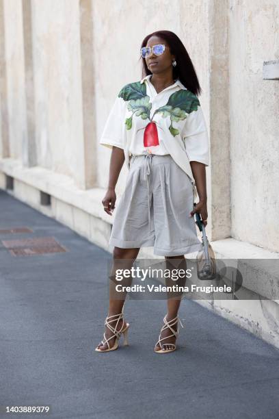 Guest is seen ahead of the Prada fashion show during the Milan Fashion Week S/S 2023 on June 19, 2022 in Milan, Italy.