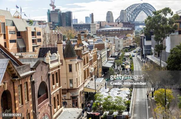 the rocks, old part of sydney with harbour bridge - australian cafe stock pictures, royalty-free photos & images